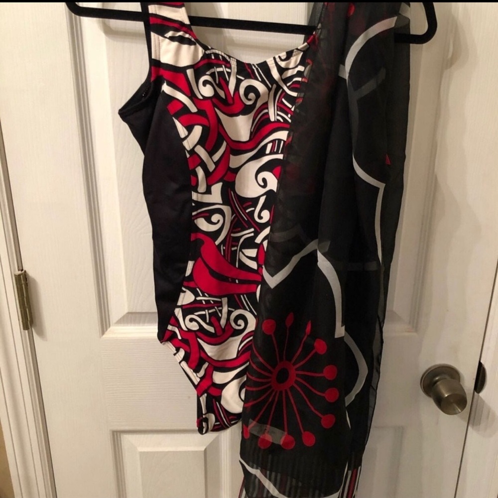 NWOT one piece boutique swimsuit with matching sarong scarf. Size 10